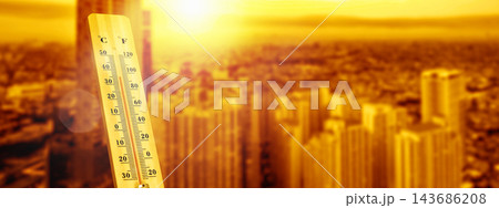 Wooden thermometer showing high temperatures against a warm, sunny cityscape background, representing heatwave and global warming concept. Wooden thermometer showing high temperatures against a warm, sunny cityscape background, representing heatwave and global warming concept. 143686208