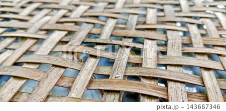 Close up of traditional bamboo woven basket texture 143687346