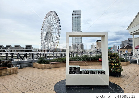 Rinku Premium Outlets Sign with Rinku Gate Tower Building and Giant Ferris Wheel in Osaka, Japan. 143689513