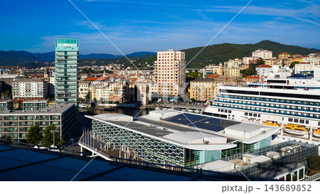 Savona, Italy - cruise ship moored at the dock of the historic port at Savona, Italy 143689852