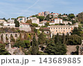 Savona, Italy with port and hillside buildings, panoramic coastal view 143689885
