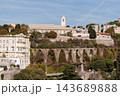 Savona, Italy with port and hillside buildings, panoramic coastal view 143689888