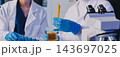 Medical or scientific researcher or man doctor looking at a test tube of clear solution in a laboratory 143697025