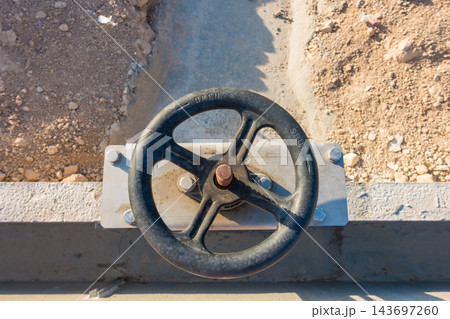 Manual Water Control Valve with Handwheel in Irrigation Canal Manual Water Control Valve with Handwheel in Irrigation Canal 143697260