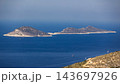 Kalkan, Turkey. Two low rocky islands sit in a vast deep-blue sea 143697926