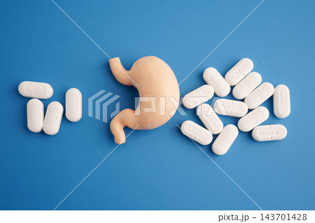 Bangkok, Thailand September 25, 2026 Stomach human model with pill drug treatment. 143701428