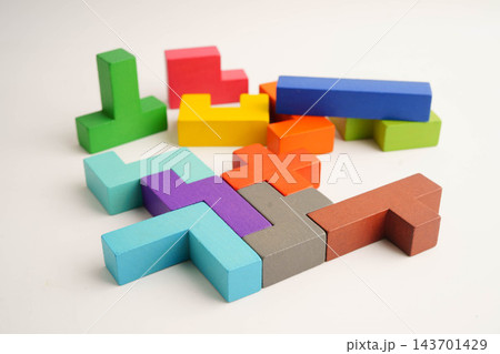 Logical thinking solution, wooden puzzle geometric shape block. Logical thinking solution, wooden puzzle geometric shape block. 143701429