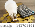 Cost of electric utilities with light bulb for payment. 143701491
