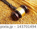 Judge gavel hammer with wheat ear grain from agriculture farm. 143701494