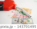 Gas pump, Fuel Nozzle with banknote money for cost energy. 143701495