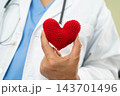 Asian woman doctor holding red heart for health in hospital. 143701496