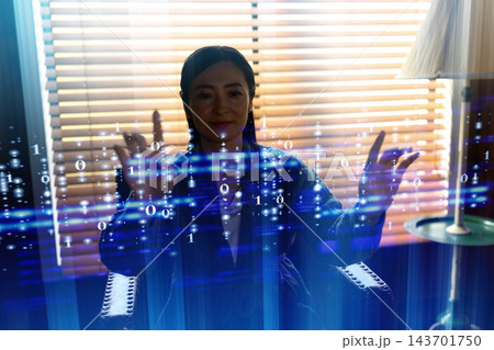 デジタルデータに囲まれて操作する女性のポートレート デジタルデータに囲まれて操作する女性のポートレート 143701750
