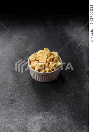 White cocoa butter chunks, used as an ingredient for making chocolate and sweets White cocoa butter chunks, used as an ingredient for making chocolate and sweets 143702051