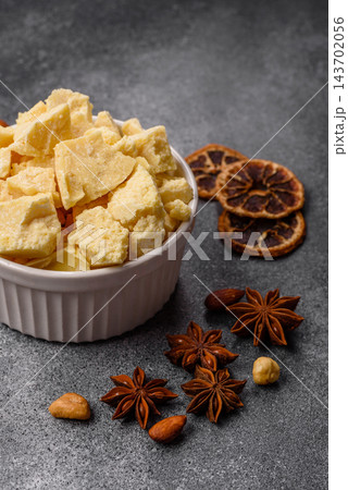 White cocoa butter chunks, used as an ingredient for making chocolate and sweets 143702056
