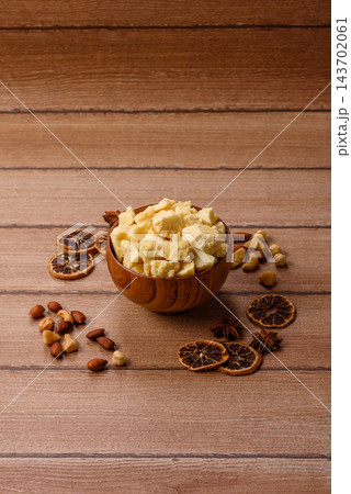 White cocoa butter chunks, used as an ingredient for making chocolate and sweets 143702061
