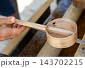 Hand with hishaku at chozuya in Shitenno-ji Temple, Osaka 143702215