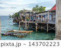 Fishermen houses and boats in Bajo village of Pulau Papan Sulawesi Indonesia 143702223