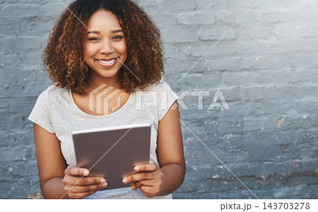 Happy, portrait and tablet with designer black woman on brick wall background for creative research. Internet, project management and tech with smile of employee for professional web development 143703278