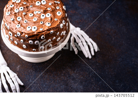 Spooky Halloween cake with eyes 143705512