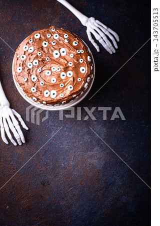 Spooky Halloween cake with eyes Spooky Halloween cake with eyes 143705513
