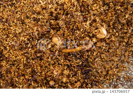 Close-up overhead texture of traditional Spanish seafood black r 143706057