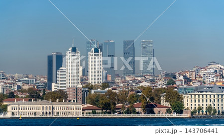Istanbul skyline, Turkey, with modern skyscrapers rising behind historic waterfront buildings and trees on the European shore of the Bosphorus 143706441