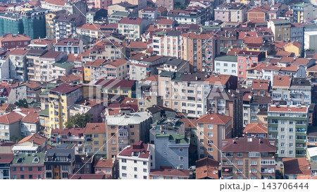 Mass housing in Istanbul, Turkey, packed apartment blocks in a crowded neighborhood of red roofs with almost no green space Mass housing in Istanbul, Turkey, packed apartment blocks in a crowded neighborhood of red roofs with almost no green space 143706444