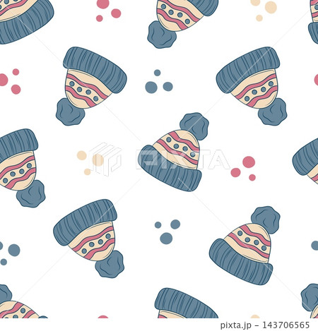 Seamless vector pattern with blue knitted winter hats and pompoms Seamless vector pattern with blue knitted winter hats and pompoms 143706565