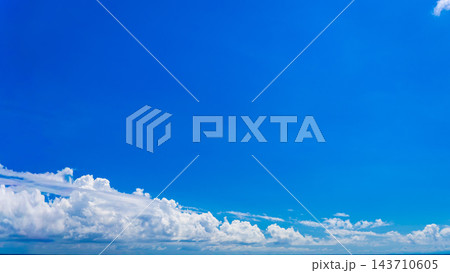The blue sky and clouds are in widescreen aspect ratio as the background. The blue sky and clouds are in widescreen aspect ratio as the background. 143710605