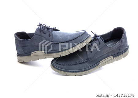 Blue men's lace-up shoes on a white background 143713179