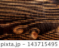 abstract geometric low poly triangle mosaic pattern in warm brown and copper tones, modern textured background 143715495