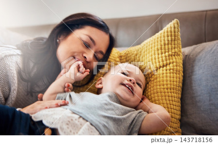 Happy, games and mother with baby on a bed for playing, bonding and morning routine in their home together. Smile, family and woman with kid in a bedroom for learning, teaching or child development 143718156