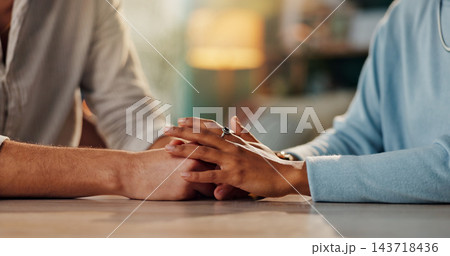 People, hands and table with empathy for relationship, .... or trust in house. Couple, together and solidarity in home with support or kindness, helping others with comfort or prayer in living room 143718436