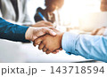 Deal, handshake and partnership with business people in office together for collaboration closeup. Interview, meeting and thank you with employee team shaking hands for hiring, recruitment or welcome 143718594