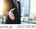 Company, handshake and partnership for b2b deal, discussion and business with hiring recruitment. Office, workers or employees with teamwork or collaboration in workplace for finance or accounting 143718598
