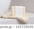 Unbranded herbal soap on soap saver bag in beige bathroom, Natural handmade product 143720036