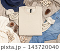 Blank beige sweatshirt mockup near rustic Christmas decor, flat lay. Holiday apparel template 143720040