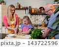 Family teaches dough kneading skills, Parents and child learn baking techniques together, Family collaboratively learns and observes art of kneading and baking dough Family teaches dough kneading skills, Parents and child learn baking techniques together, Family collaboratively learns and observes art of kneading and baking dough 143722596