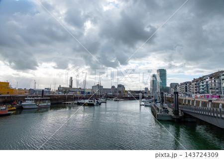 Ostend marina and modern sky tower apartments under cloudy sky in Belgium. Ostend marina and modern sky tower apartments under cloudy sky in Belgium. 143724309