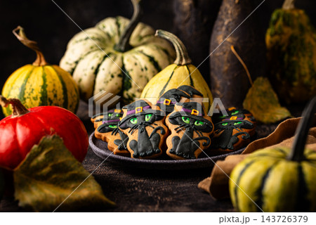 Halloween cookies in shape of black cat Halloween cookies in shape of black cat 143726379