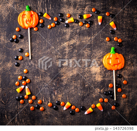Halloween candy in shape of pumpkin jack-o-lantern Halloween candy in shape of pumpkin jack-o-lantern 143726398