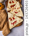 Spooky Halloween taco in shape of jack-o-lantern 143726403