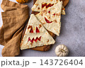 Spooky Halloween taco in shape of jack-o-lantern 143726404