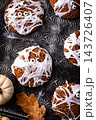 Spooky Halloween mummy cookies with eyes 143726407