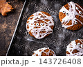 Spooky Halloween mummy cookies with eyes 143726408