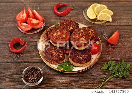 Homemade patties made from ground beef and pork featuring onion, tomato, lemon, garlic, recipe for delicious schnitzels and beef steaks, menu options for cafe banner for fastfood establishment Homemade patties made from ground beef and pork featuring onion, tomato, lemon, garlic, recipe for delicious schnitzels and beef steaks, menu options for cafe banner for fastfood establishment 143727569