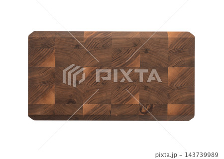 Handmade stacked cutting board from black walnut with oil finish isolated 143739989