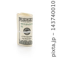 Pack of dollars rolled with a rubber band isolated 143740010