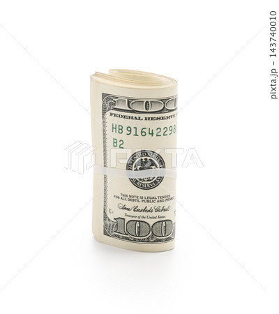 Pack of dollars rolled with a rubber band isolated 143740010