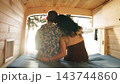 Mature couple embracing enjoying nature from camper van 143744860